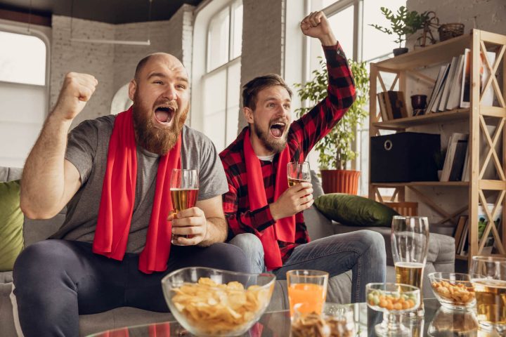 excited-happy-friends-watch-sport-match-together-2024-10-11-11-53-42-utc.jpg